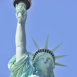 statue of liberty closeup with blue sky in new york city manhattan Freiheitsstatue